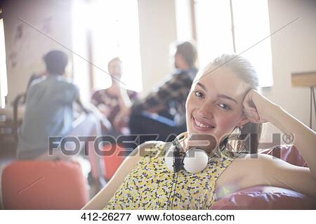 Portrait smiling casual businesswoman with headphones View Large Photo Image Stock Photo - Portrait smiling casual businesswoman with headphones. Fotosearch