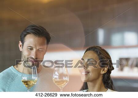 Couple wine tasting View Large Photo Image Stock Photo - Couple wine tasting . Fotosearch