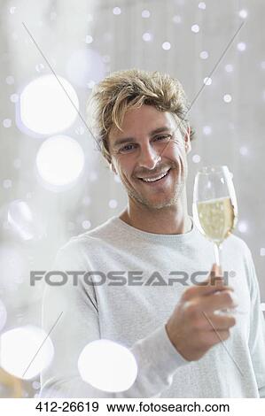Portrait smiling man drinking white wine View Large Photo Image Stock Photo - Portrait smiling man drinking white wine. Fotosearch