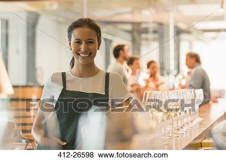 Portrait smiling winery tasting room worker View Large Photo Image Stock Photo - Portrait smiling winery tasting room worker. Fotosearch