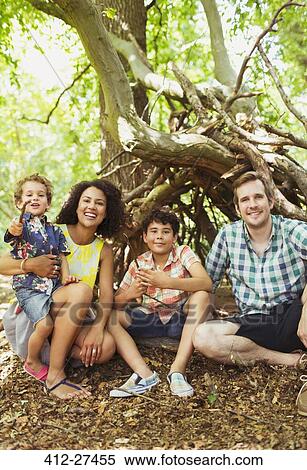 Portrait smiling family in woods View Large Photo Image Stock Photography - Portrait smiling family in woods. Fotosearch