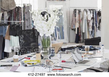 Bouquet, proofs, swatches and clothing in fashion design office View Large Photo Image Stock Photo - Bouquet, proofs, swatches and clothing in fashion design office. Fotosearch
