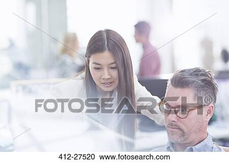 Business people working in office View Large Photo Image Stock Image - Business people working in office. Fotosearch