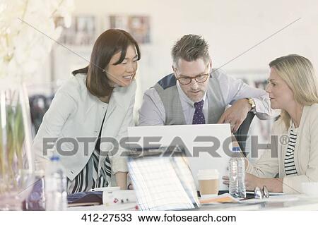 Fashion designers brainstorming in office View Large Photo Image Stock Image - Fashion designers brainstorming in office. Fotosearch