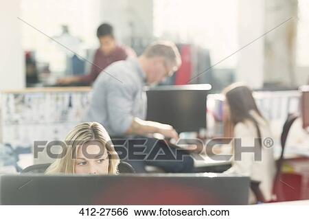 Fashion designers working in office View Large Photo Image Stock Photograph - Fashion designers working in office. Fotosearch