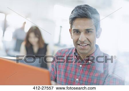 Portrait confident businessman with digital tablet View Large Photo Image Stock Photo - Portrait confident businessman with digital tablet. Fotosearch