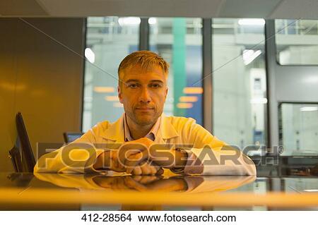 Picture - Portrait serious engineer in factory. Fotosearch