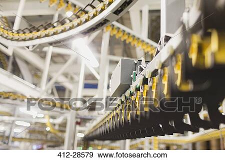 Printing press conveyor belts in printing plant View Large Photo Image Stock Photo - Printing press conveyor belts in printing plant. Fotosearch
