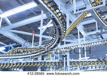 Winding printing press conveyor belts overhead View Large Photo Image Stock Photography - Winding printing press conveyor belts overhead. Fotosearch
