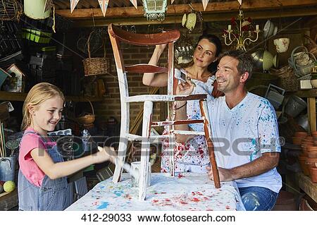 Family painting chair in workshop View Large Photo Image Stock Image - Family painting chair in workshop. Fotosearch