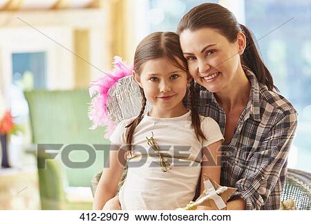 Portrait smiling mother and daughter with wings View Large Photo Image Stock Photo - Portrait smiling mother and daughter with wings. Fotosearch