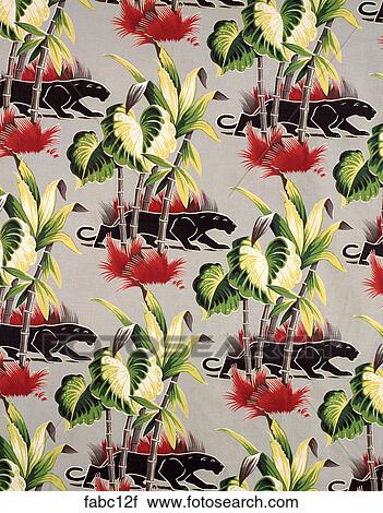 Stock Image - Style: Tropical Green leaves & trees w/ Black Panther Fabrics . Fotosearch