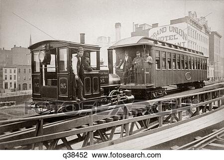 1900S Locomotive & One Passenger Car Running On East 42Nd Street Group Of Men On Board Grand Union Hotel In Background View Large Photo Image Stock Image - 1900S Locomotive & One Passenger Car Running On East 42Nd Street Group Of Men On Board Grand Union Hotel In Background. Fotosearch
