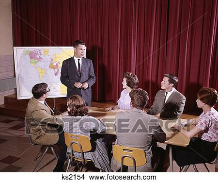 Picture - 1960 1960S 7 Students Teacher Around A Table Study Group Student Government Meeting High School Discussion Retro . Fotosearch