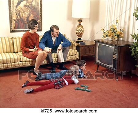 1960S Family In Living Room Watching Tv Father Mother Sister Brother View Large Photo Image Stock Photography - 1960S Family In Living Room Watching Tv Father Mother Sister Brother . Fotosearch