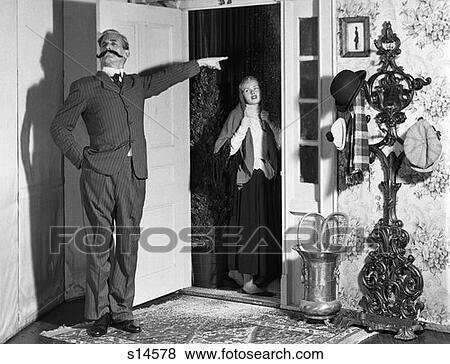 1960S Set-Up Of Victorian Man With Handlebar Mustache Banishing Woman In Doorway View Large Photo Image Stock Photo - 1960S Set-Up Of Victorian Man With Handlebar Mustache Banishing Woman In Doorway . Fotosearch