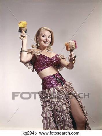 1960S Woman Caribbean Costume Shaking Maracas Dancing View Large Photo Image Stock Photography - 1960S Woman Caribbean Costume Shaking Maracas Dancing. Fotosearch