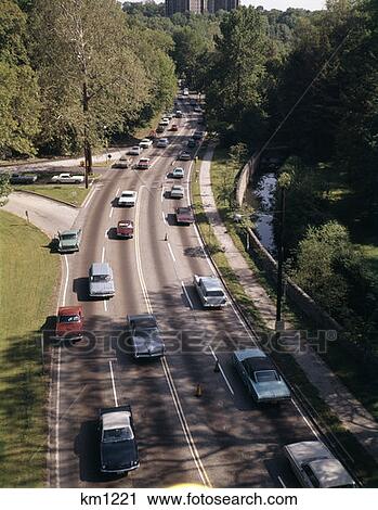 1970 1970S Elevated View Traffic Cars Road Through Park Philadelphia Road Lane Lanes Retro View Large Photo Image Stock Image - 1970 1970S Elevated View Traffic Cars Road Through Park Philadelphia Road Lane Lanes Retro. Fotosearch