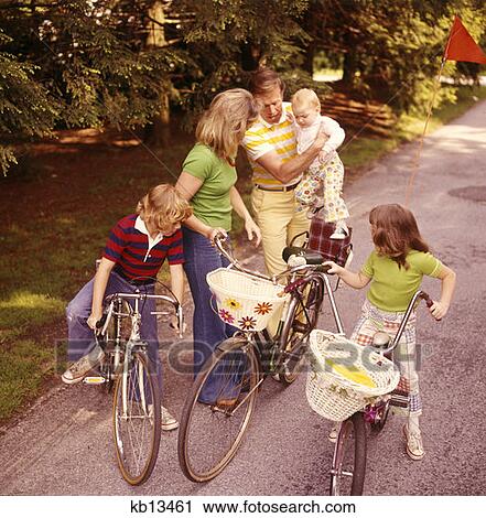 1970 1970S Family Mother Father 3 Kids Bike Trip Biking Bikes Activity Families Boy Girl Man Woman Retro View Large Photo Image Stock Image - 1970 1970S Family Mother Father 3 Kids Bike Trip Biking Bikes Activity Families Boy Girl Man Woman Retro . Fotosearch