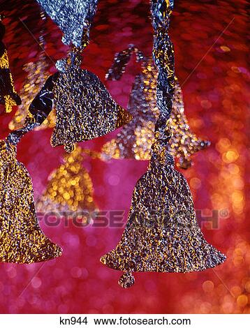 1970 1970S Gold Silver Blue Bells Bell Wrapped In Foil Shiny Glittery Pink Red Background Christmas Year Ringing Retro View Large Photo Image Picture - 1970 1970S Gold Silver Blue Bells Bell Wrapped In Foil Shiny Glittery Pink Red Background Christmas Year Ringing Retro. Fotosearch