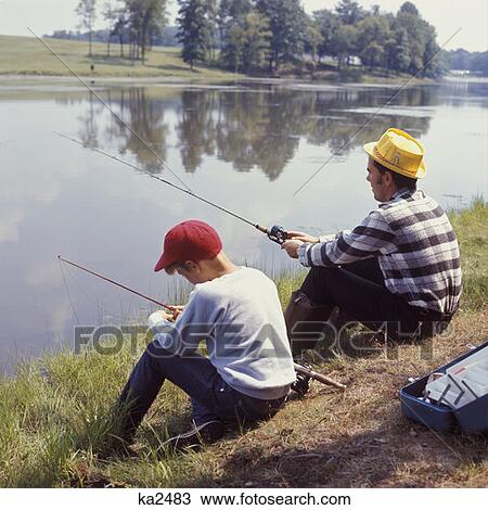 1970 1970S Man Boy Sitting River Bank Lake Fishing Father Son Family Families Male Retro View Large Photo Image Stock Image - 1970 1970S Man Boy Sitting River Bank Lake Fishing Father Son Family Families Male Retro . Fotosearch
