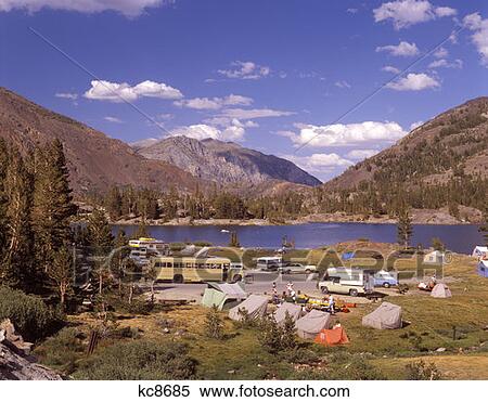 1970 1970S Public Campsite Camp Ground Rv Cars Trailers Bus Campers Tioga Lake Yosemite National Park California Retro View Large Photo Image Stock Photography - 1970 1970S Public Campsite Camp Ground Rv Cars Trailers Bus Campers Tioga Lake Yosemite National Park California Retro . Fotosearch