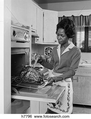 1970 1970S Retro Black Woman African American Oven Turkey Thanksgiving View Large Photo Image Stock Photograph - 1970 1970S Retro Black Woman African American Oven Turkey Thanksgiving. Fotosearch