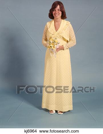 1970 1970S Teen Teenage Girl Formal Dress Attire Yellow Polka Dot Prom Dress High School Date Fashion Proms View Large Photo Image Picture - 1970 1970S Teen Teenage Girl Formal Dress Attire Yellow Polka Dot Prom Dress High School Date Fashion Proms . Fotosearch