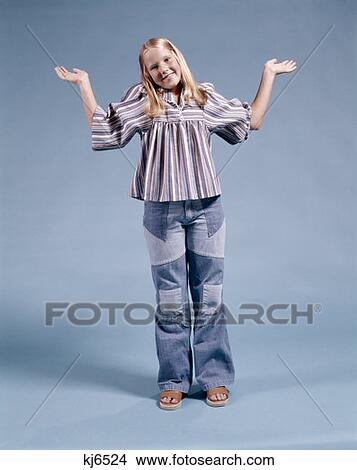1970 1970S Teenage Girls Standing With Arms In The Air View Large Photo Image Picture - 1970 1970S Teenage Girls Standing With Arms In The Air. Fotosearch