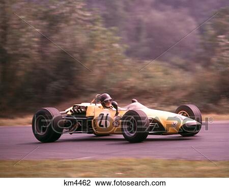 1970 1970S Yellow Sports Race Racing Car Driver Black Helmet Number 21 Auto Automobile Cars View Large Photo Image Stock Image - 1970 1970S Yellow Sports Race Racing Car Driver Black Helmet Number 21 Auto Automobile Cars . Fotosearch