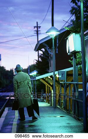 Stock Photography - 1970S 1980S Man Commuter Waiting For Train . Fotosearch