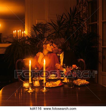 https://fscomps.fotosearch.com/compc/CLT/CLT001/1970s-1980s-man-woman-couple-kissing-at-stock-images__kd4116.jpg