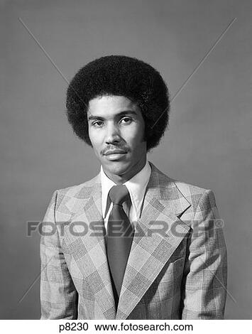 1970S Afr0-American Portrait Male With Afro Wearing Plaid Jacket & Wide Solid Tie View Large Photo Image Stock Image - 1970S Afr0-American Portrait Male With Afro Wearing Plaid Jacket & Wide Solid Tie . Fotosearch