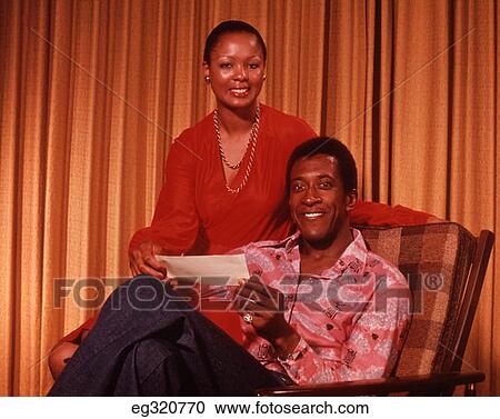 1970S African-American Couple Smiling Holding Check Stock ...