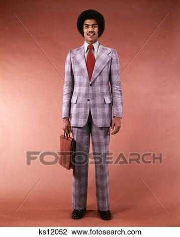 1970S African-American Ethnic Businessman Portrait Full Figure Hold Briefcase In Glen Plaid Suit Man Fashion Afro Hair View Large Photo Image Stock Image - 1970S African-American Ethnic Businessman Portrait Full Figure Hold Briefcase In Glen Plaid Suit Man Fashion Afro Hair. Fotosearch