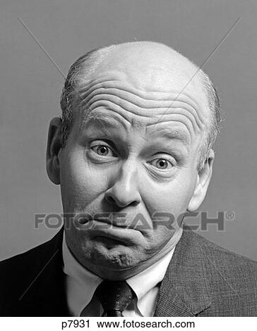 Stock Image - 1970S Bald Man Wrinkled Brow Sad Depressed Funny Facial Expression . Fotosearch