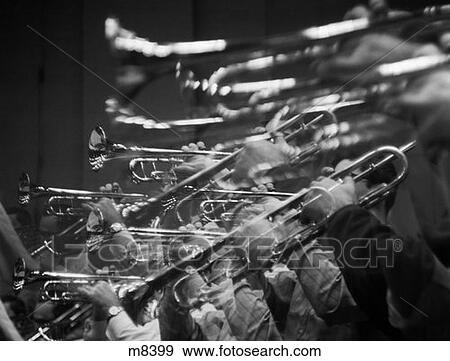 Stock Photo - 1970S Blurred Motion Brass Trumpets Orchestra Band . Fotosearch