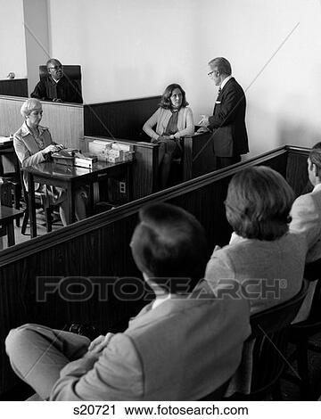 1970S Courtroom Scene Female Witness Being Questioned While Jury Looks On Indoor View Large Photo Image Stock Image - 1970S Courtroom Scene Female Witness Being Questioned While Jury Looks On Indoor . Fotosearch