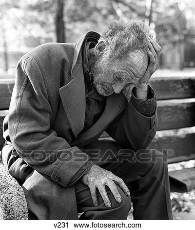 1970S Destitute Elderly Man Sitting On Park Bench With Head In Hands Outdoor View Large Photo Image Stock Image - 1970S Destitute Elderly Man Sitting On Park Bench With Head In Hands Outdoor . Fotosearch
