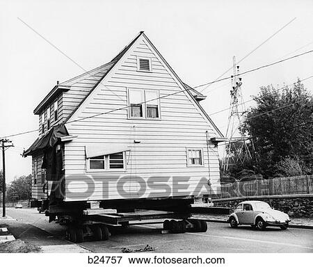 1970S House Being Moved On Wheels Along Street View Large Photo Image Stock Photo - 1970S House Being Moved On Wheels Along Street . Fotosearch