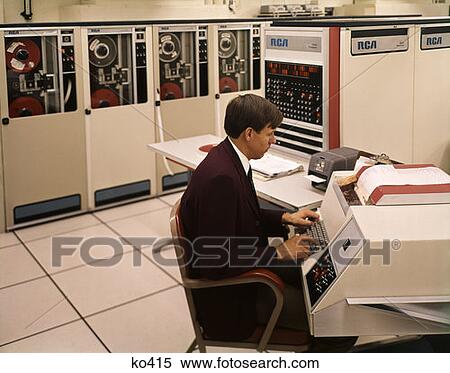 1970S Man Seated Keyboard Work Station Rca Information System Data Processing Mainframe Technology View Large Photo Image Stock Photography - 1970S Man Seated Keyboard Work Station Rca Information System Data Processing Mainframe Technology. Fotosearch