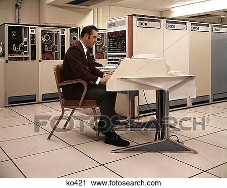 1970S Man Sitting Computer Work Station Rca Main Frames Data Information System View Large Photo Image Stock Image - 1970S Man Sitting Computer Work Station Rca Main Frames Data Information System. Fotosearch