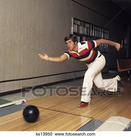 1970S Man Stripe Shirt Flare Leg Pants Throwing Bowling Ball Down Lane Alley Shoes Fashion Release Good Form View Large Photo Image Stock Image - 1970S Man Stripe Shirt Flare Leg Pants Throwing Bowling Ball Down Lane Alley Shoes Fashion Release Good Form. Fotosearch