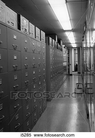 Stock Photography - 1970S Office Interior Corridor Lined With Metal File Cabinets Boxes Storage Step Stool . Fotosearch