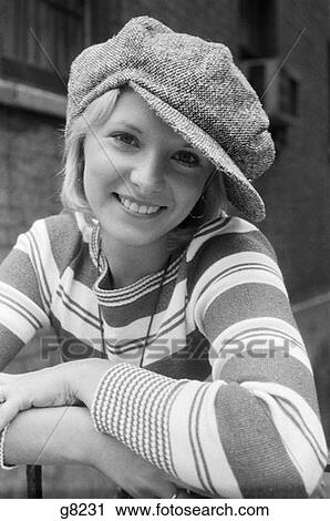 1970S Portrait Female In Floppy Wool Visor Cap And Striped Knit Top View Large Photo Image Stock Image - 1970S Portrait Female In Floppy Wool Visor Cap And Striped Knit Top . Fotosearch