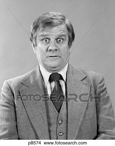1970S Portrait Middle Aged Business Man With Surprised Shocked Facial Expression View Large Photo Image Picture - 1970S Portrait Middle Aged Business Man With Surprised Shocked Facial Expression . Fotosearch