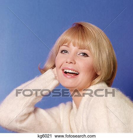 1970S Portrait Of Girl With Blonde Hair And White Sweater View Large Photo Image Stock Image - 1970S Portrait Of Girl With Blonde Hair And White Sweater. Fotosearch