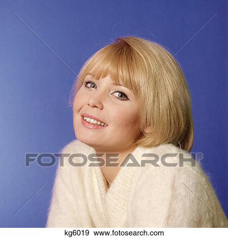 1970S Portrait Woman With Blonde Hair And White Sweater View Large Photo Image Stock Photo - 1970S Portrait Woman With Blonde Hair And White Sweater. Fotosearch
