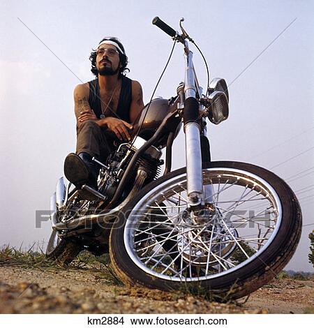 1970S Tattooed Man On Easy Rider Motocycle View Large Photo Image Picture - 1970S Tattooed Man On Easy Rider Motocycle . Fotosearch