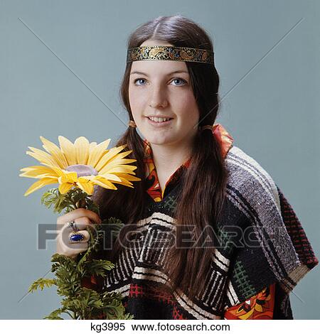 1970S Teen Girl Woman Smiling Headband Serape Pigtails Fashion Stereotype Mod Hippie Flower Child Sunflower View Large Photo Image Stock Photography - 1970S Teen Girl Woman Smiling Headband Serape Pigtails Fashion Stereotype Mod Hippie Flower Child Sunflower. Fotosearch